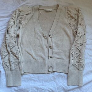 Waist length button sweater
